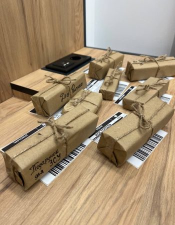 Вміст замовлення від Defensio Knifes: ніж, пакування, стікер