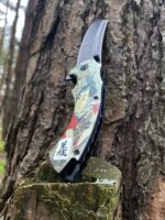 Ніж Самурай із пружинним механізмом для швидкого відкриття.